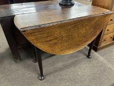 A George III mahogany drop leaf dining table with oval top, tapering legs and pad feet, 105cm wide