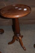 A 20th Century mahogany wine table with tripod base, 49cm high