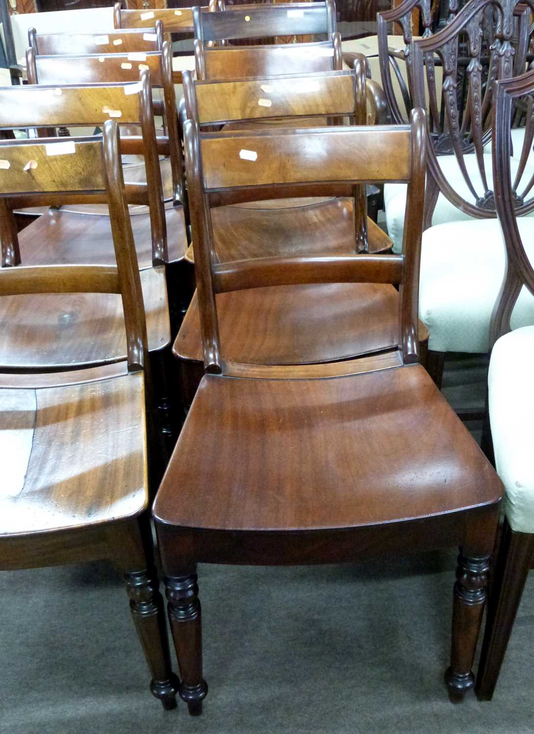 A harlequin set of late Georgian mahogany dining chairs comprising six standard chairs and four - Image 2 of 4