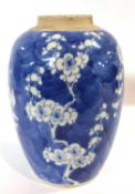 A 19th Century Chinese porcelain jar, the blue ground with prunus decoration, (a/f)