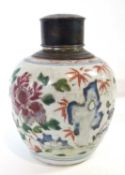 A Chinese jar with polychrome decoration with white metal rim and cover