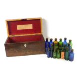 19th Century mahogany apothecary box set with a graduated group of coloured bottles, the interior