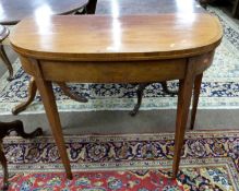 A Georgian faded mahogany D shaped tea table with inlaid banding, 91cm wide