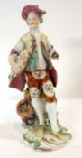 An 18th Century Derby patch mark figure of a shepherd, 24cm high (some restoration)
