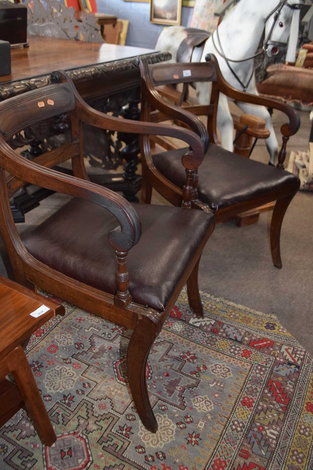 A pair of Georgian mahogany sabre leg carver chairs of typical form with drop in seats - Image 2 of 2