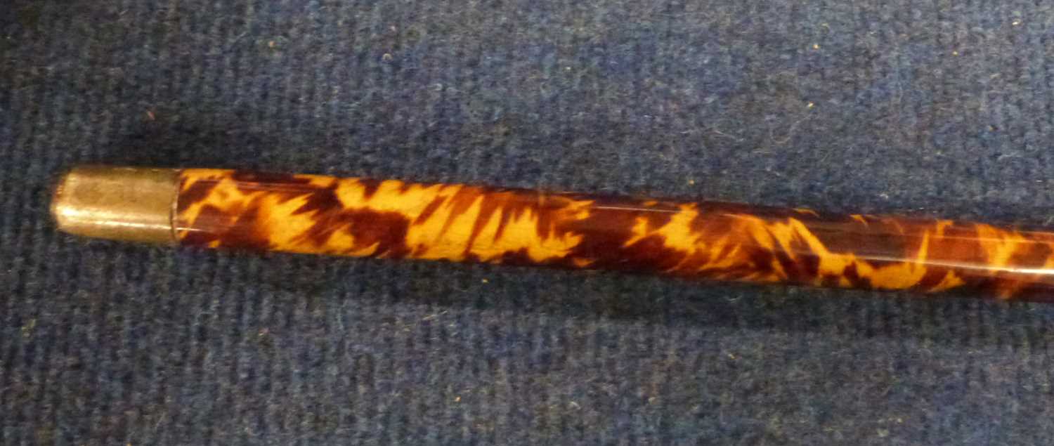 A tortoiseshell and white metal topped walking cane, 88cm long - Image 2 of 3