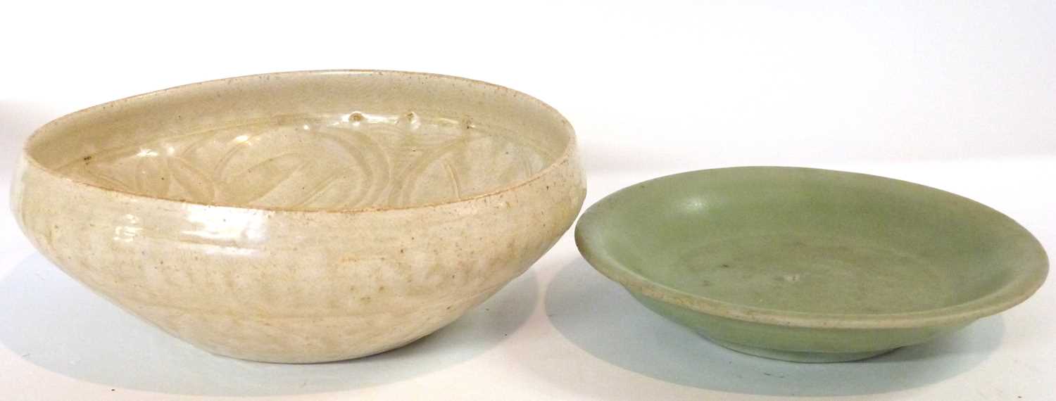 Group of four pottery dishes, one possibly Song Dynasty, further small plate with celadon ground, - Image 6 of 8