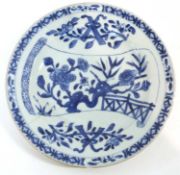 An 18th Century Chinese porcelain plate with blue and white designs within brown line rim, 22cm
