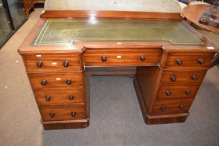 A Victorian break front mahogany twin pedestal desk with green leather inset top, 120cm wide Good