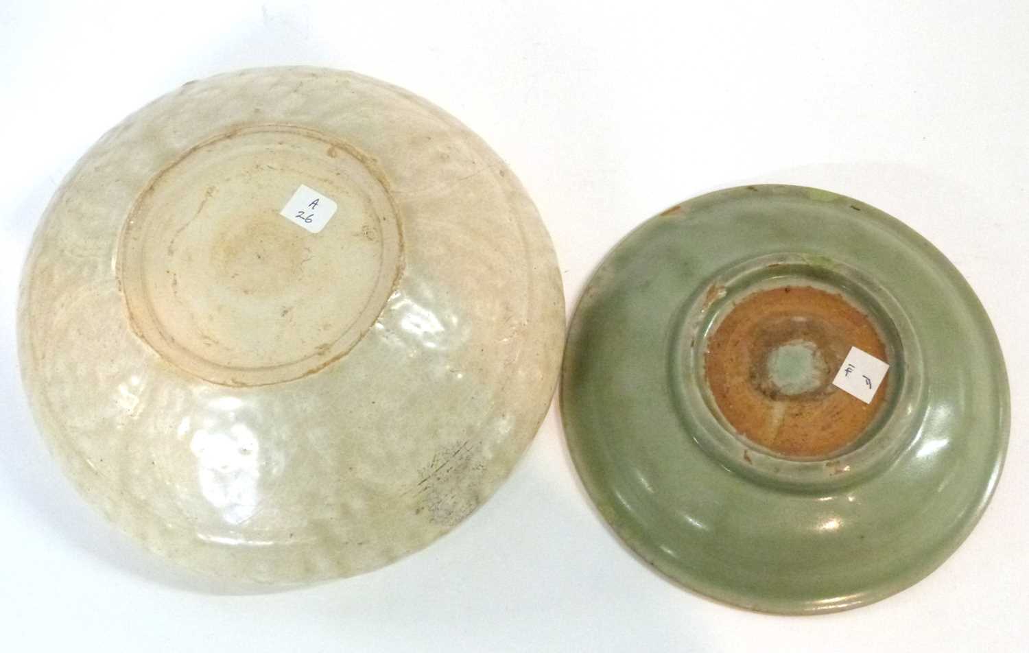 Group of four pottery dishes, one possibly Song Dynasty, further small plate with celadon ground, - Image 8 of 8