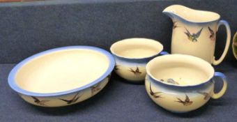 A Victorian jug and basin set together with two matching chamber pots, soap dishes and covers, all