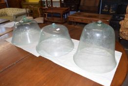 Garden Interest - A group of three aqua glass bell cloches of slightly differing designs, largest