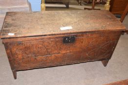 A 17th Century and later oak plank coffer with simple geometric design to the front, 108cm wide