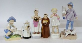 Group of Royal Worcester child figures by Dorothy Doughty together with two Royal Worcester candle