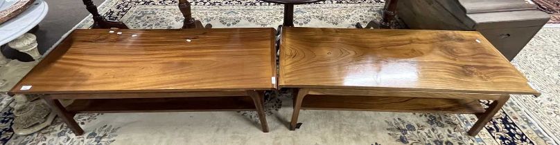 A pair of 20th Century hardwood coffee tables of rectangular form with base shelves, 126cm long (