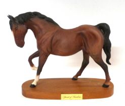 A Beswick model of a horse entitled Spirit of Freedom mounted on oval wooden base with title
