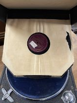 A Columbia portable gramophone together with a quantity of 78rpm records (Item 76 on vendor list)
