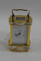 L'Eppe, a good quality miniture carriage clock with brass and mother of pearl mounted body, 8.5cm