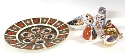 A Royal Crown Derby dish with an Imari design together with five Royal Crown Derby paperweights