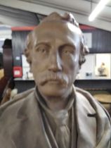 A moulded plaster bust of Dr Livingstone set on a circular plinth base signed M G Culley SCPT,
