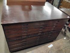 Early 20th Century dark wood plan chest with ten drawers with inset handles, 132cm wide