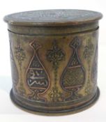 Trench Art - A German shell case and cover dated 1915 decorated with Islamic vases and script,