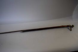 Base metal topped swagger stick together with a further horn handled walking cane