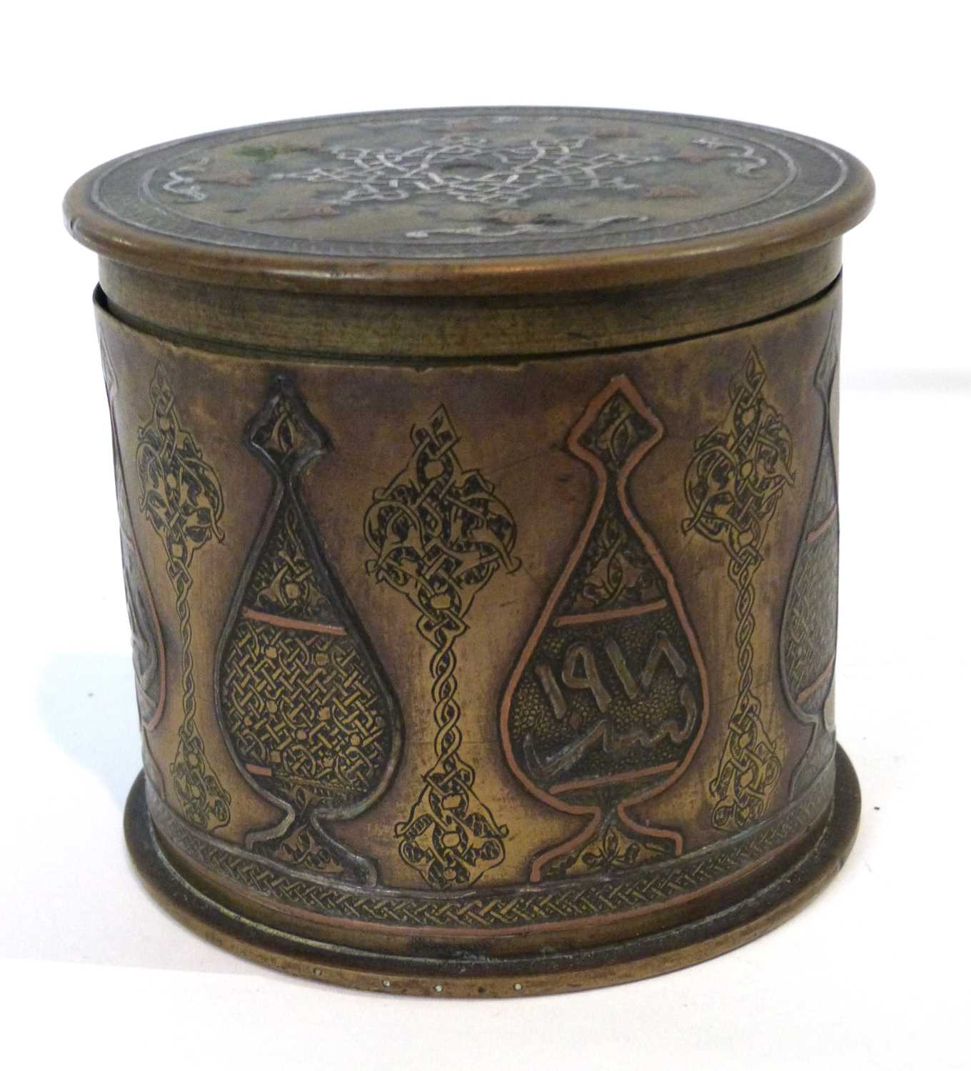 Trench Art - A German shell case and cover dated 1915 decorated with Islamic vases and script, - Image 4 of 6