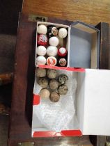 Golfing Interest - Two boxes containing a range of early golf balls to include examples marked Ben