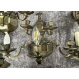 A trio of 20th Century five branch wall lights with bronzed finish, 40cm high