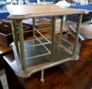 Late 19th or early 20th Century oak and brass mounted revolving table top book case, 32cm high
