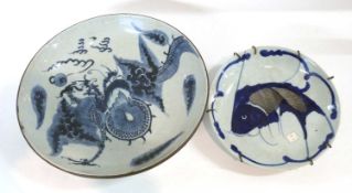 A Chinese porcelain dish with dragon decoration together with a further Japanese dish with fish