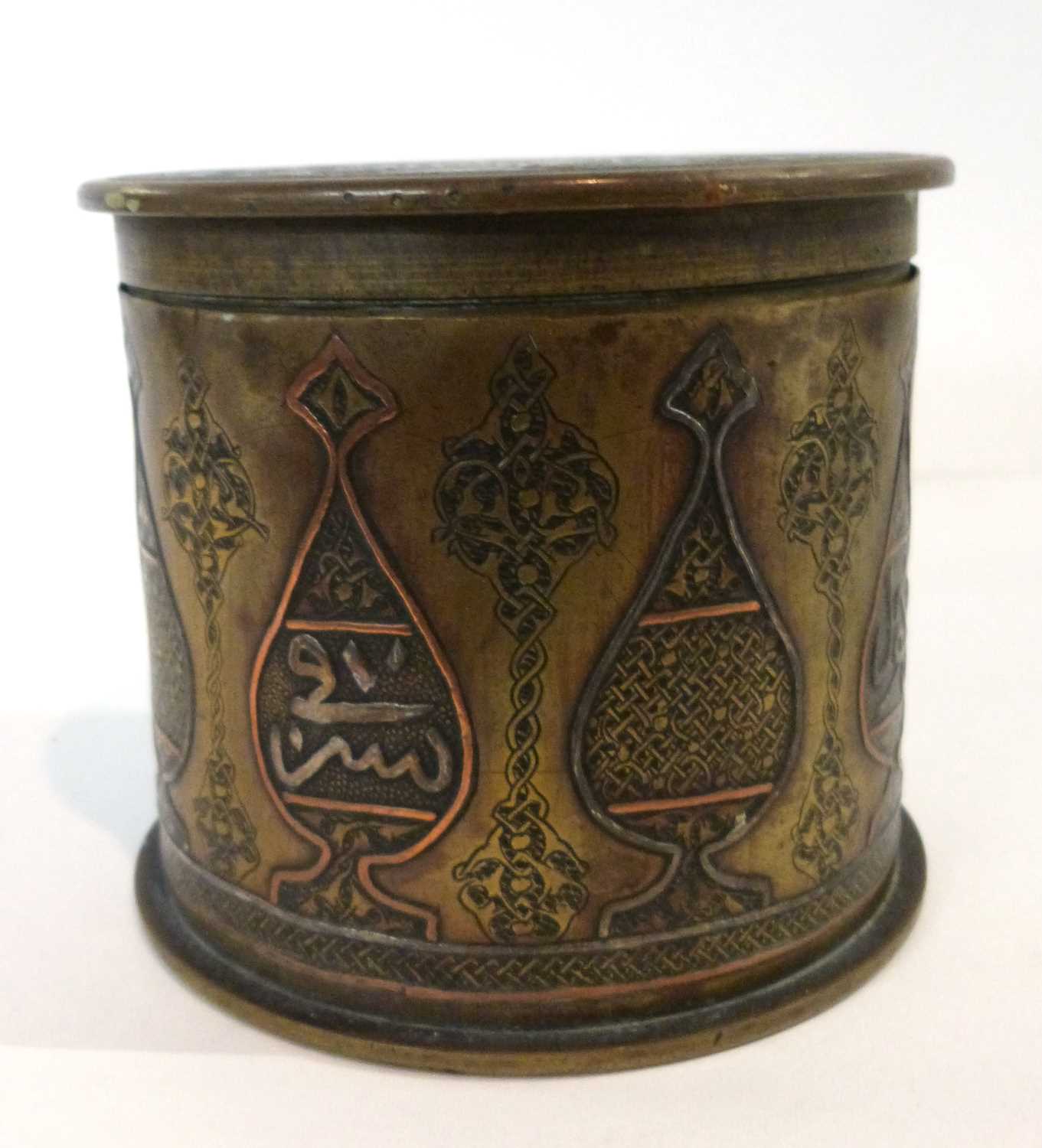 Trench Art - A German shell case and cover dated 1915 decorated with Islamic vases and script, - Image 2 of 6