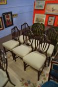 A set of six mahogany Heppelwhite style shield back mahogany dining chairs created with bell husk