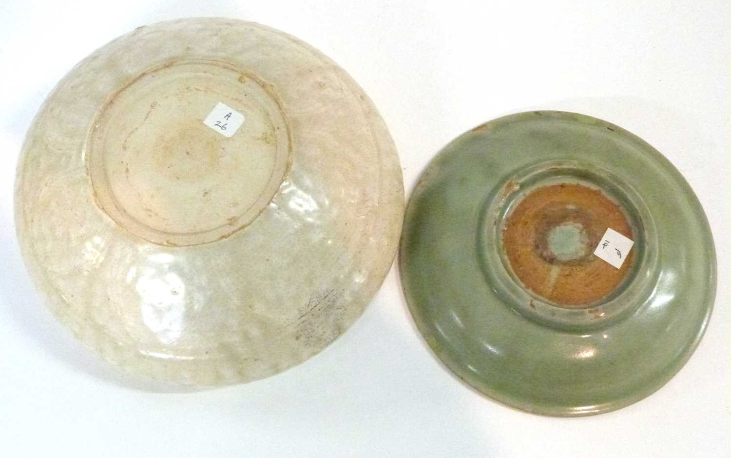 Group of four pottery dishes, one possibly Song Dynasty, further small plate with celadon ground, - Image 7 of 8
