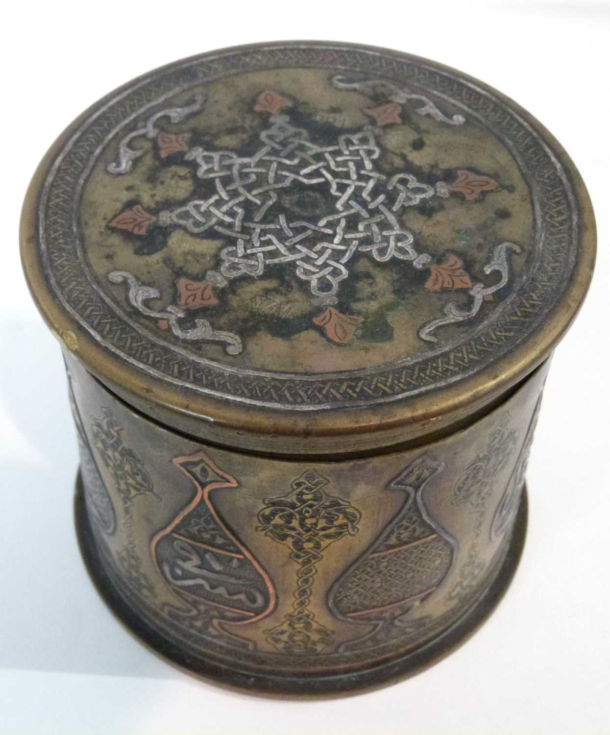 Trench Art - A German shell case and cover dated 1915 decorated with Islamic vases and script, - Image 3 of 6