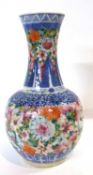 A Chinese porcelain vase of baluster shape, possible 19th Century with blue and white design with