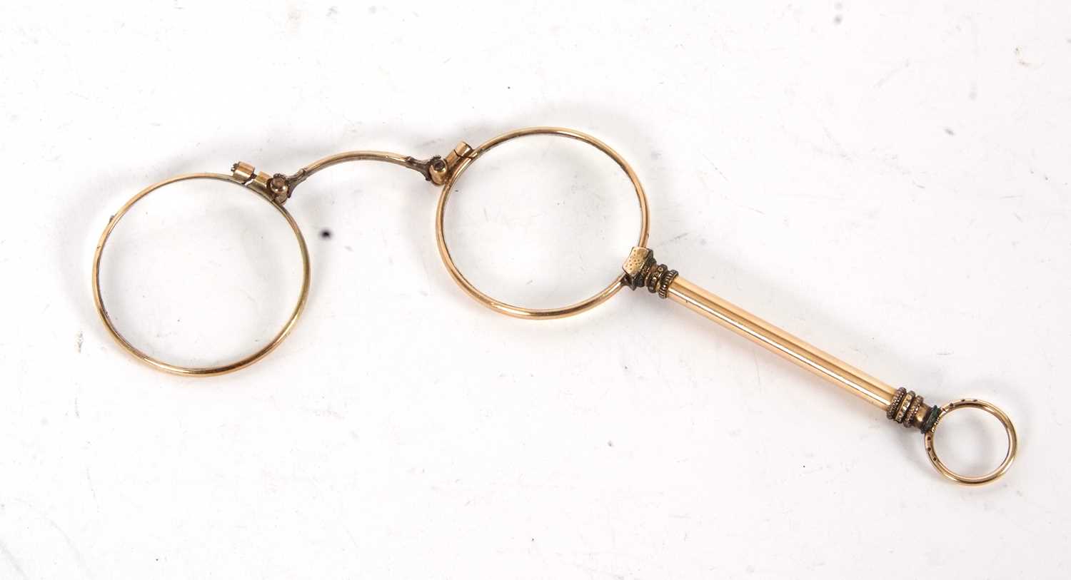 A pair of antique Lorgnette folding glasses, gold plated, in a leather pouch, 12cm long - Image 2 of 3