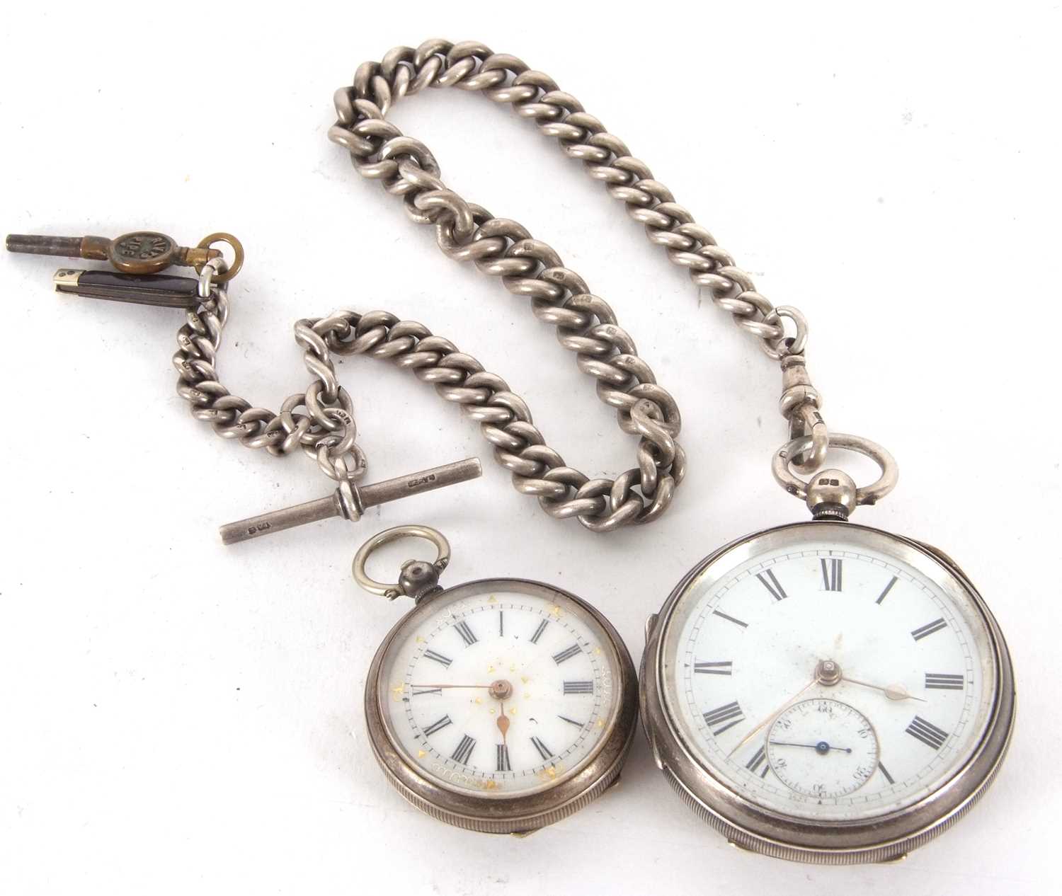 Two pocket watches, one silver gents open face pocket watch with silver albert chain, both the