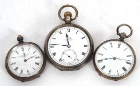 A mixed lot of three pocket watches, two are hallmarked and the other is stamped fine silver, two