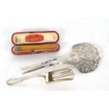 Mixed Lot: An Edwardian silver hair comb, the crown intricately pierced and engraved, with two