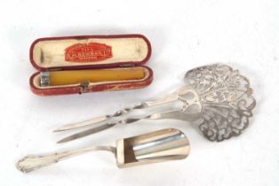 Mixed Lot: An Edwardian silver hair comb, the crown intricately pierced and engraved, with two