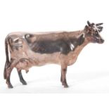 An Elizabeth II silver Guernsey cow model, filled, hallmarked Sheffield 2016, makers mark for