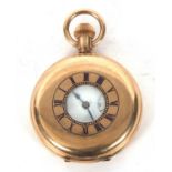 Thomas Russell & Sons of Liverpool plated half hunter pocket watch, it has a manually crown wound 10