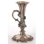 Victorian silver chamber stick having fluted stem with carrying scroll side handle, decorated with