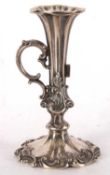 Victorian silver chamber stick having fluted stem with carrying scroll side handle, decorated with