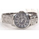 A Seiko Premier Kinetic gents wristwatch, the watch has a stainless steel case and bracelet with a