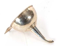 Elizabeth II silver wine funnel of typical form with a cast holding plate in the form of grapes