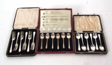 Mixed Lot: Cased set of six George VI silver cake forks, Sheffield 1936, makers mark for James Dixon