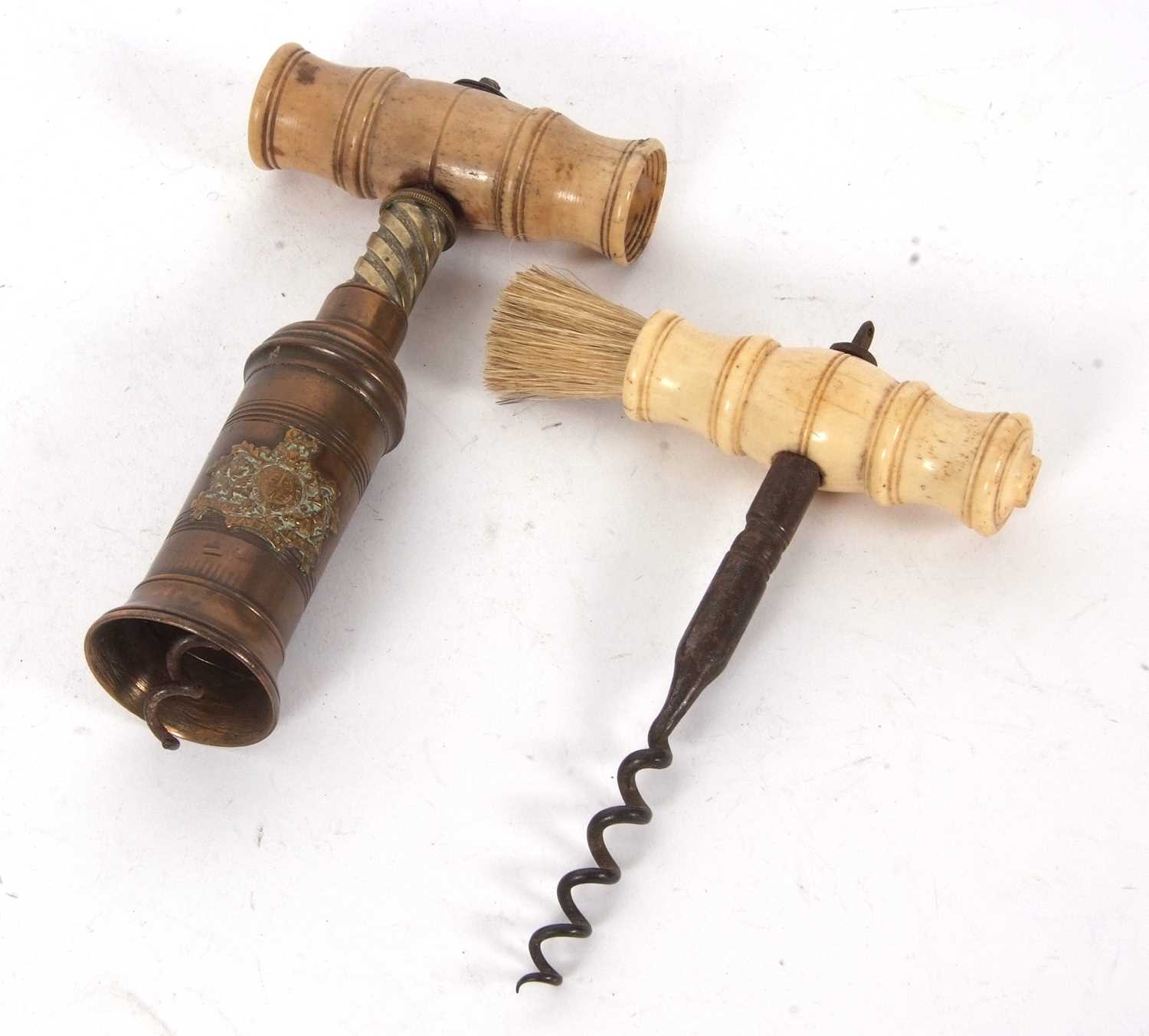 Mixed Lot: A Thomason type brass barrel corkscrew applied with a royal coat of arms, turned bone